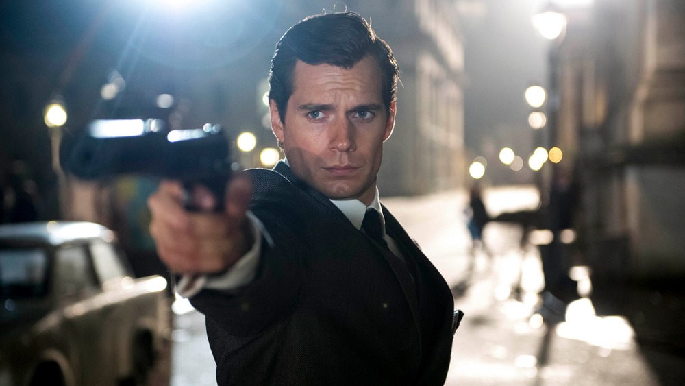 Henry Cavill pointing gun