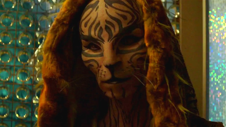 Tigris wearing a hood