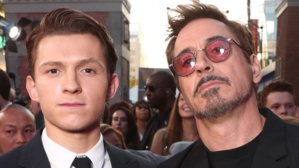 Tom Holland and Robert Downey Jr. attend the premiere of Spider-man: Homecoming in 2017.