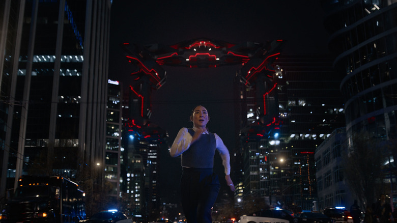 Eve Kim outrunning Grid adversaries in Tron: Ares