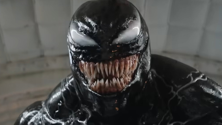 Venom smiling at a group of Imperium agents in 