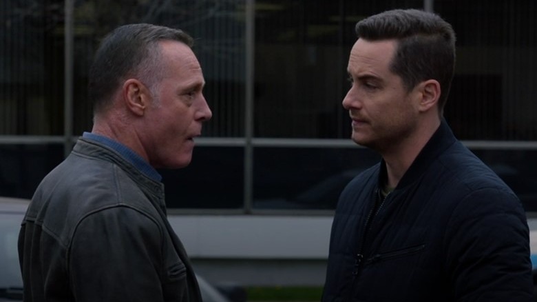 Jason Beghe and Jesse Lee Soffer facing each other