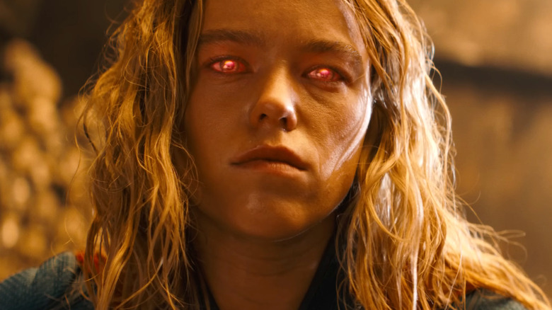 Kara Zor-El's eyes glowing red in 