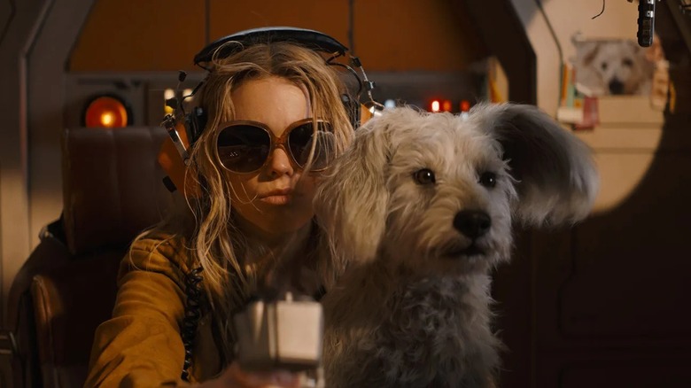 Kara Zor-El with Krypto on her lap in the "Supergirl" trailer