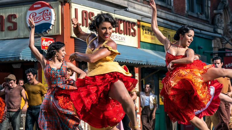 Anita and companions dance in street