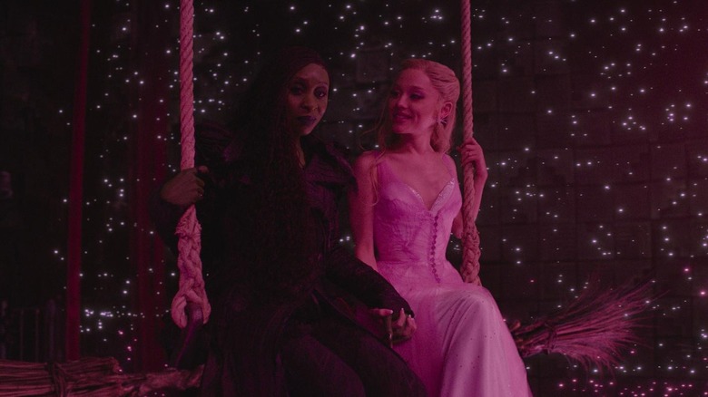 Elphaba and Glinda holding hands in Wicked: For Good (2025)