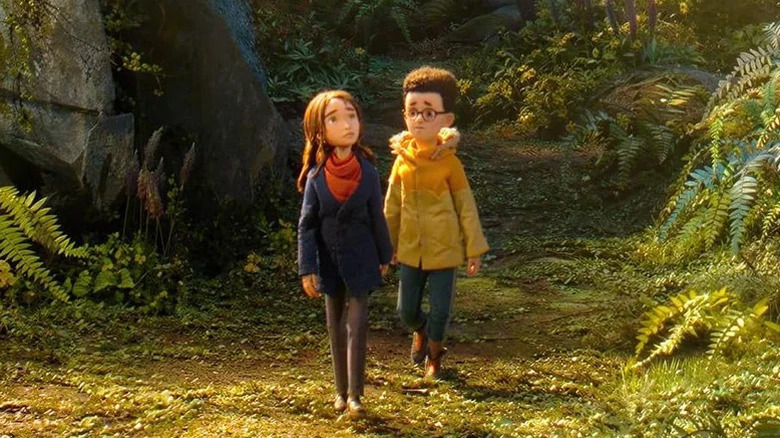 Prue and Curtis walking in the woods in Wildwood