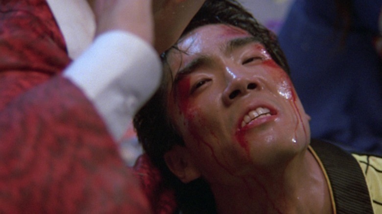 Chozen bloodied and battered