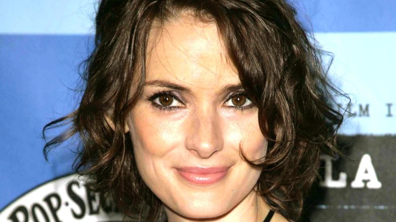 Winona Ryder smiling with short hair