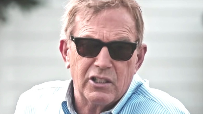 Kevin Costner angry wearing sunglasses