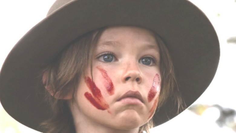 1883 kid blood on face