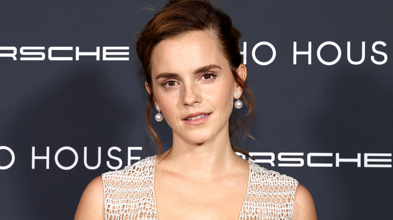 Emma Watson poses at a Porsche event