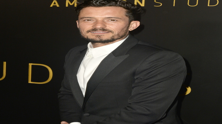 Orlando Bloom black suit