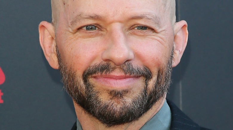 Jon Cryer smiling about to enter awards ceremony