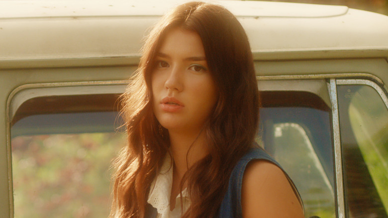 Young Tully getting out of a car