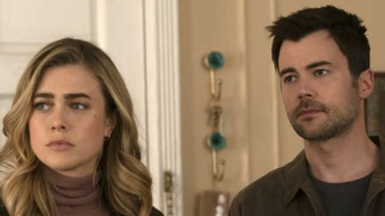 Michaela and Zeke looking on