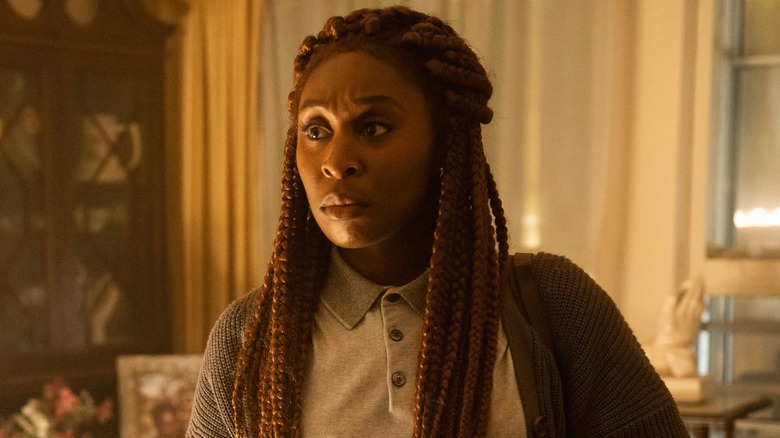 Holly looking concerned in The Outsider (2020)