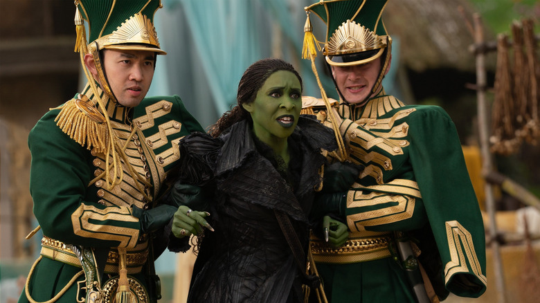 Guards grabbing Elphaba in "Wicked: For Good" (2025)