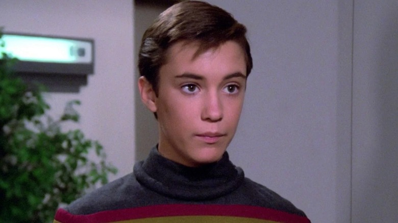 Wesley Crusher standing at attention