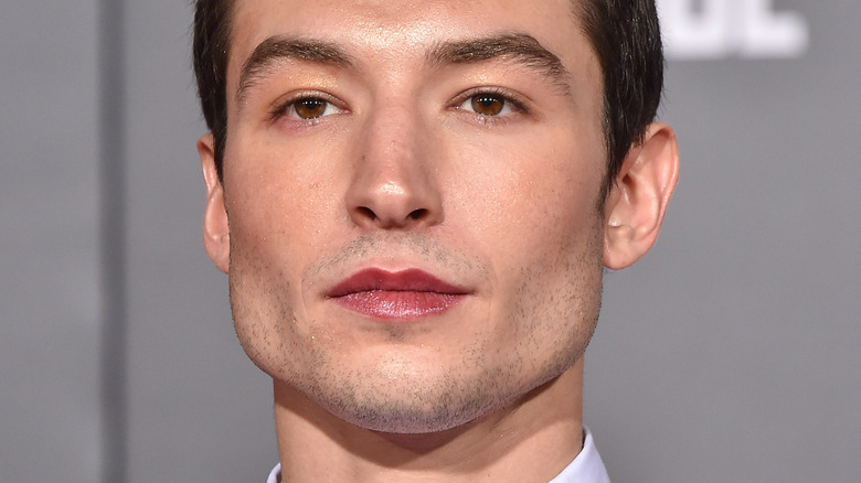 Ezra Miller staring ahead 