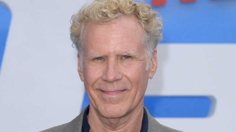 Will Ferrell wearing grey suit