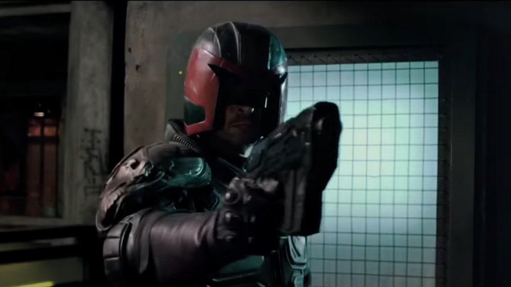 Judge Dredd carrying out a sentence in Dredd