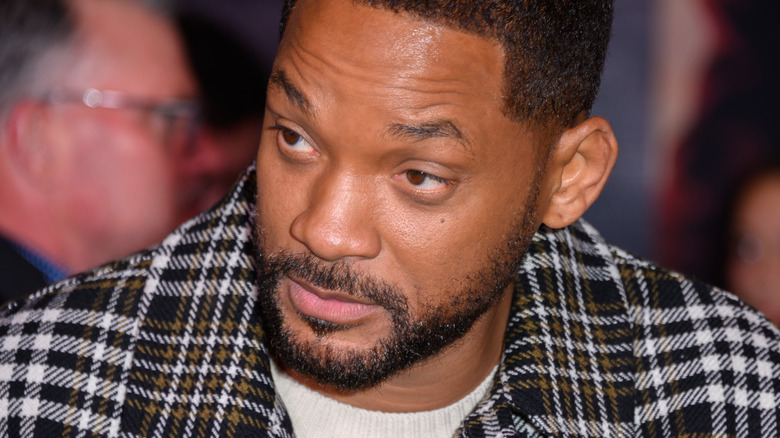 Will Smith in plaid coat