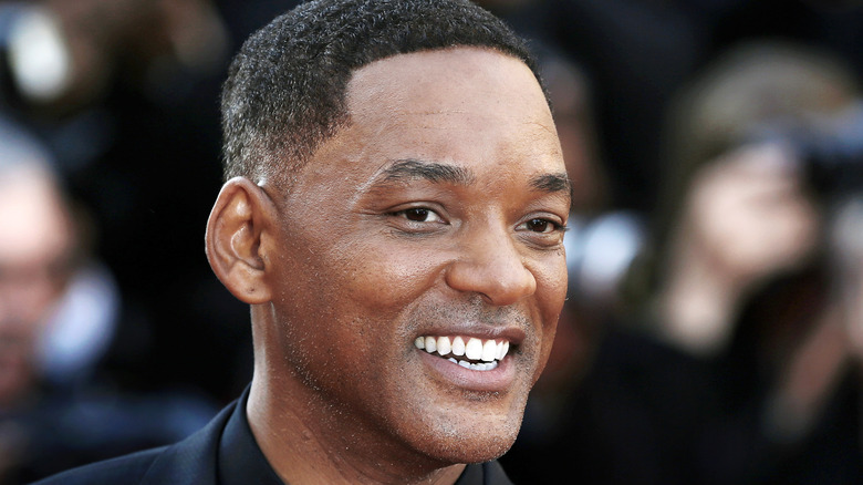 Will Smith smiles
