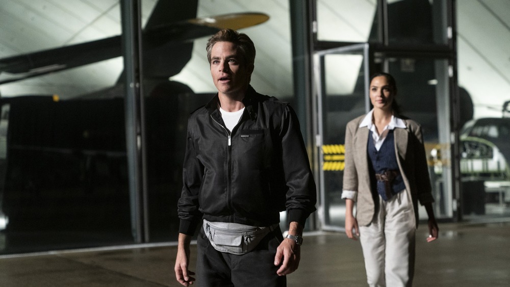 Steve Trevor amazed by planes with Diana Prince