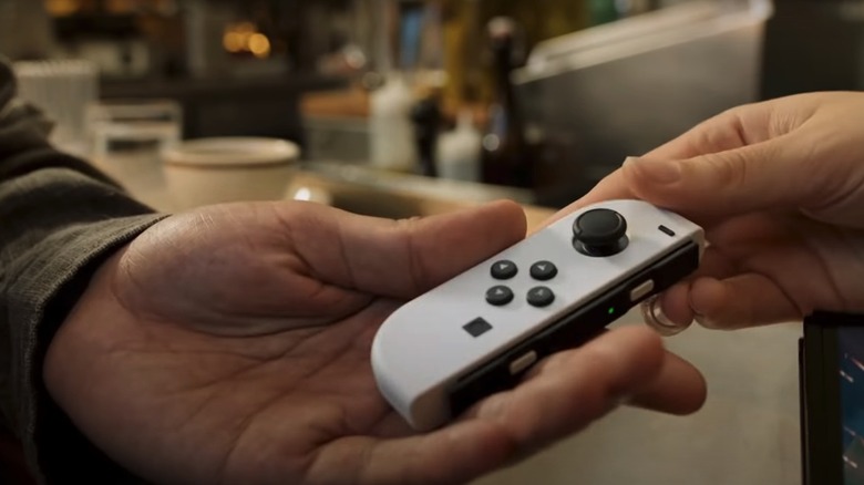 Handing over a Joy-Con
