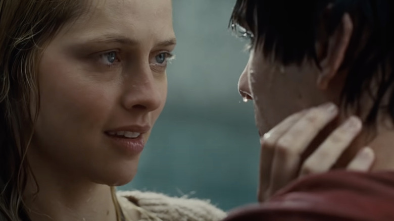 Julie and R looking at each other