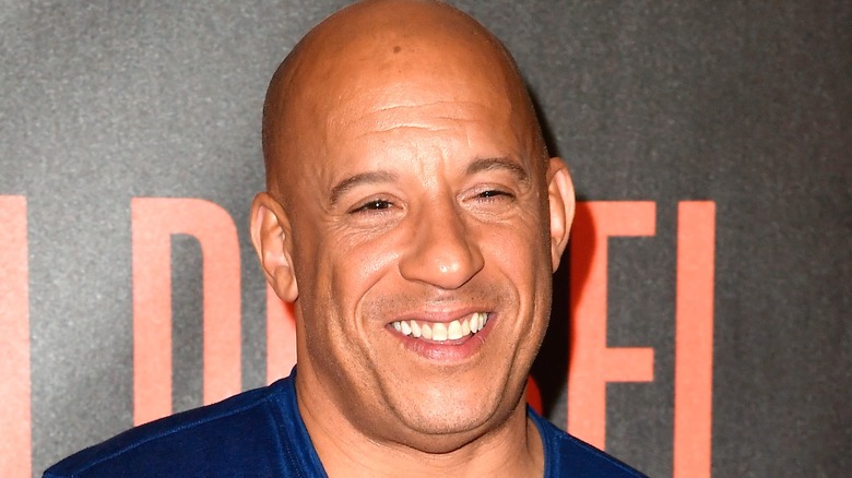 Vin Diesel smiling bloodshot red carpet