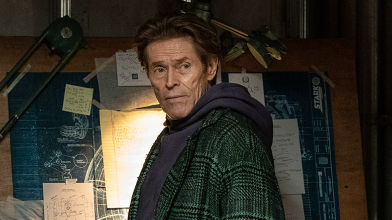 Norman Osborn in green jacket