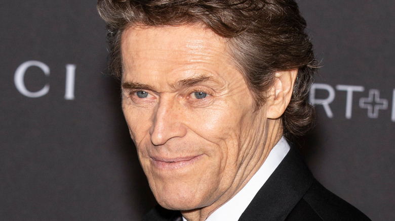 Willem Dafoe smiling