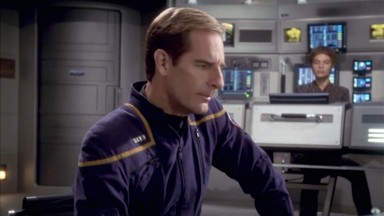 Archer with T'Pol in background