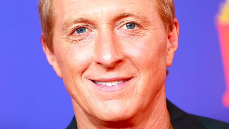 William Zabka smiling