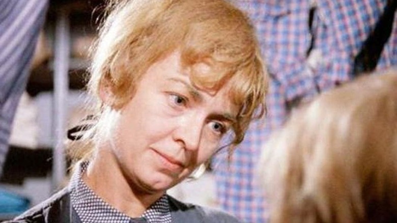 Mrs. Bucket gazing lovingly