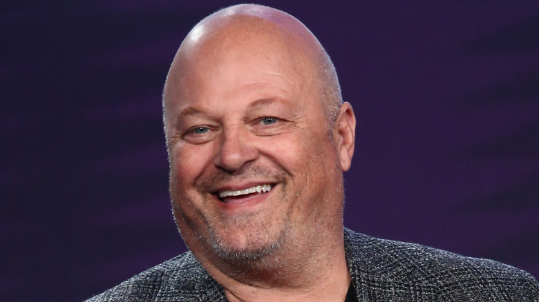 Michael Chiklis smiling at event