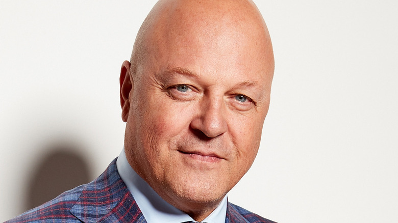 Michael Chiklis posing