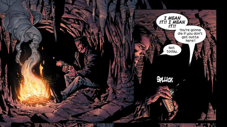 Wolverine drinking in cave