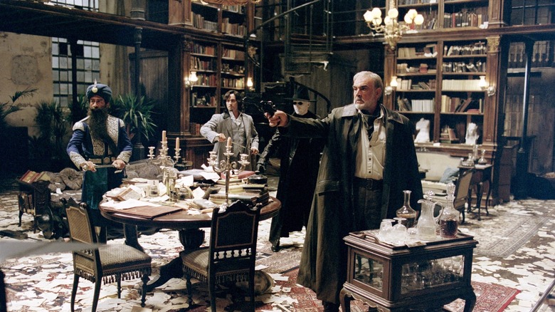 Allan Quatermain consulting with his allies in The League of Extraordinary Gentlemen (2003)