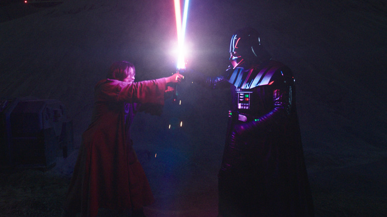 Oni-Wan and Darth Vader dueling with lightsabers in Obi-Wan Kenobi (2022)