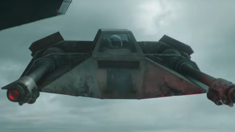 A CGI airspeeder hovering in midair over Fortress Inquisitorious in Obi-Wan Kenobi (2022)