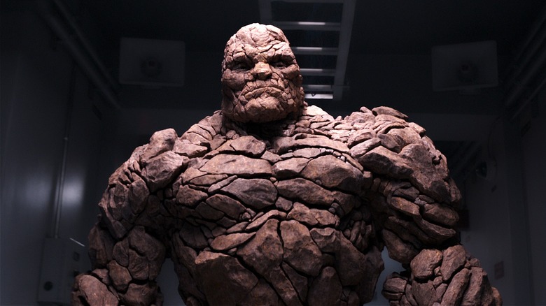 The Thing standing in a hallway in 