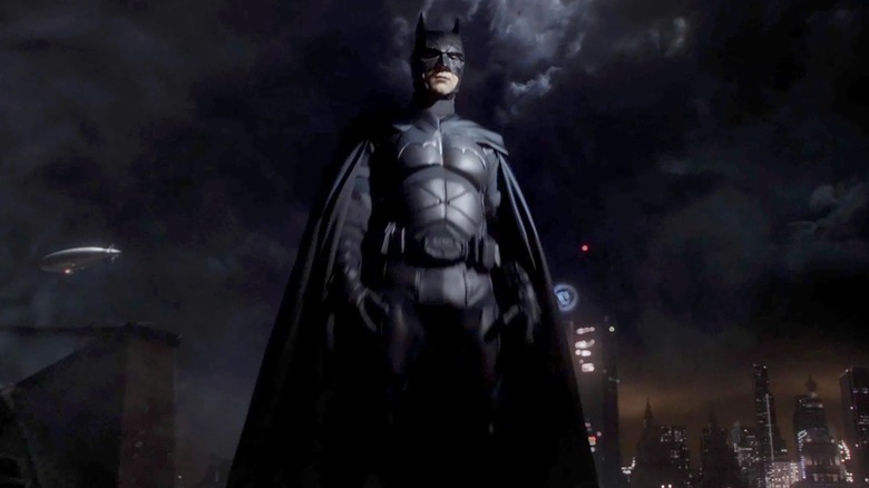 Batman looming over his city in Gotham (2019)