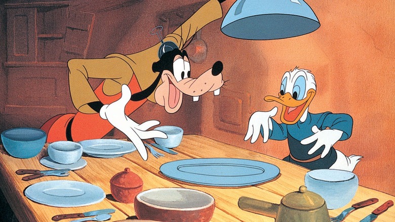 Goofy regaling Donald Duck with stories about yummy food in Fun and Fancy Free (1947)
