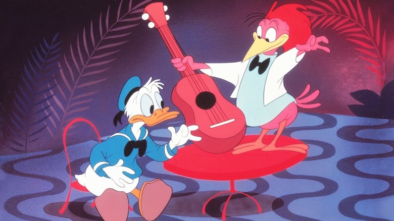 Donald Duck watching the Aracuan Bird play a guitar in Melody Time (1948)