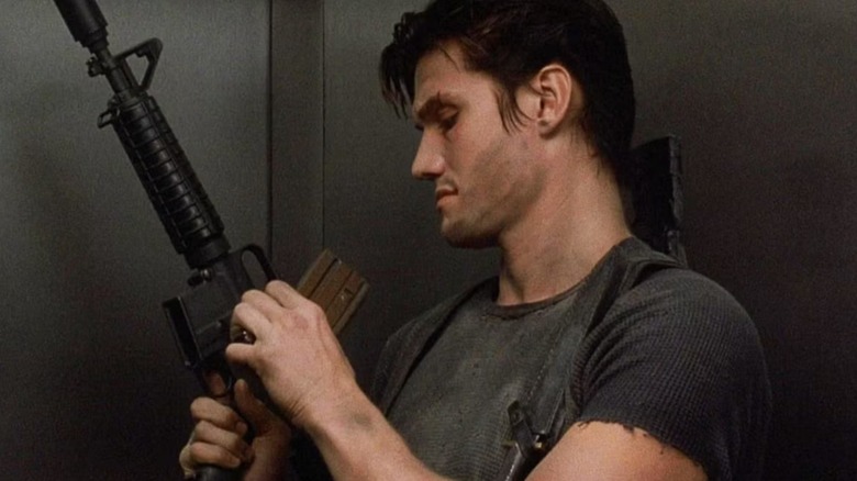 Frank Castle loading weapons