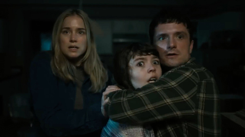 The human leads of "Five Nights at Freddy's 2" (2025) cowering.