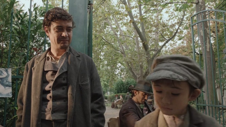 Modi conversing with a child in "Modi: Three Days on the Wing of Madness" (2025).